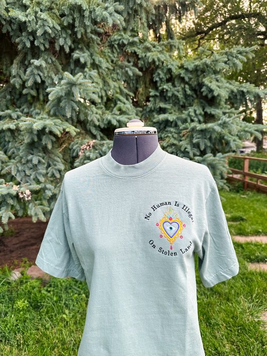 No Human Is Illegal on Stolen Land Embroidered Tshirt